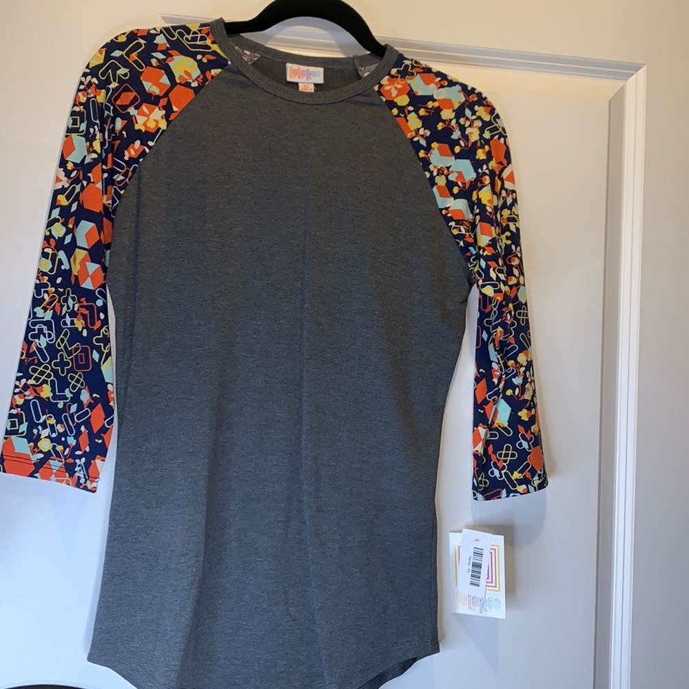 New with tags Xs Lularoe Randy top.